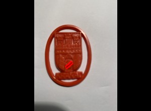 GG: Kunststoffabzeichen mit dem Wappen der Stadt Krakau aus Haussammlung, rot